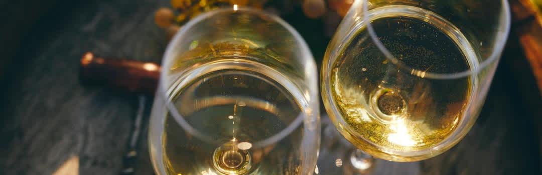 Viognier vs Chardonnay, Explained: Flavor, Pairings, and What to Buy banner image